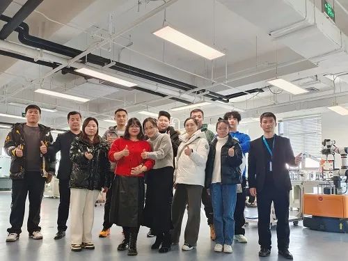 Beijing Zhongping visited the robot company headquarters for study